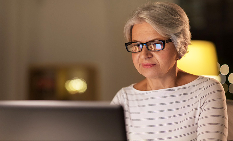 Senior using computer